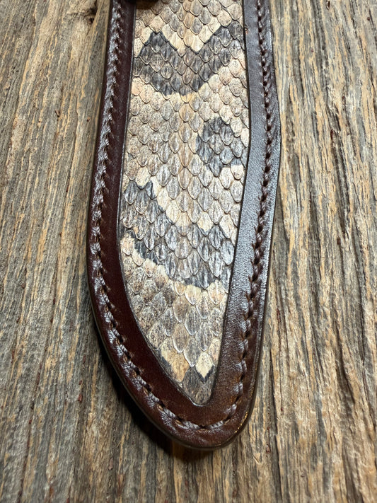 Randall Model 1-7 sheath with a Canebrake RattleSnake skin from Treeman Sheaths. Vibrant colors and along side Copperheads the hardest skin to source.