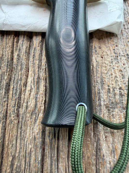 New in Paper Randall Model 14-7.5 in Black Micarta handle, Nickel Silver Hilt, Stainless steel, Sawteeth and Lanyard.