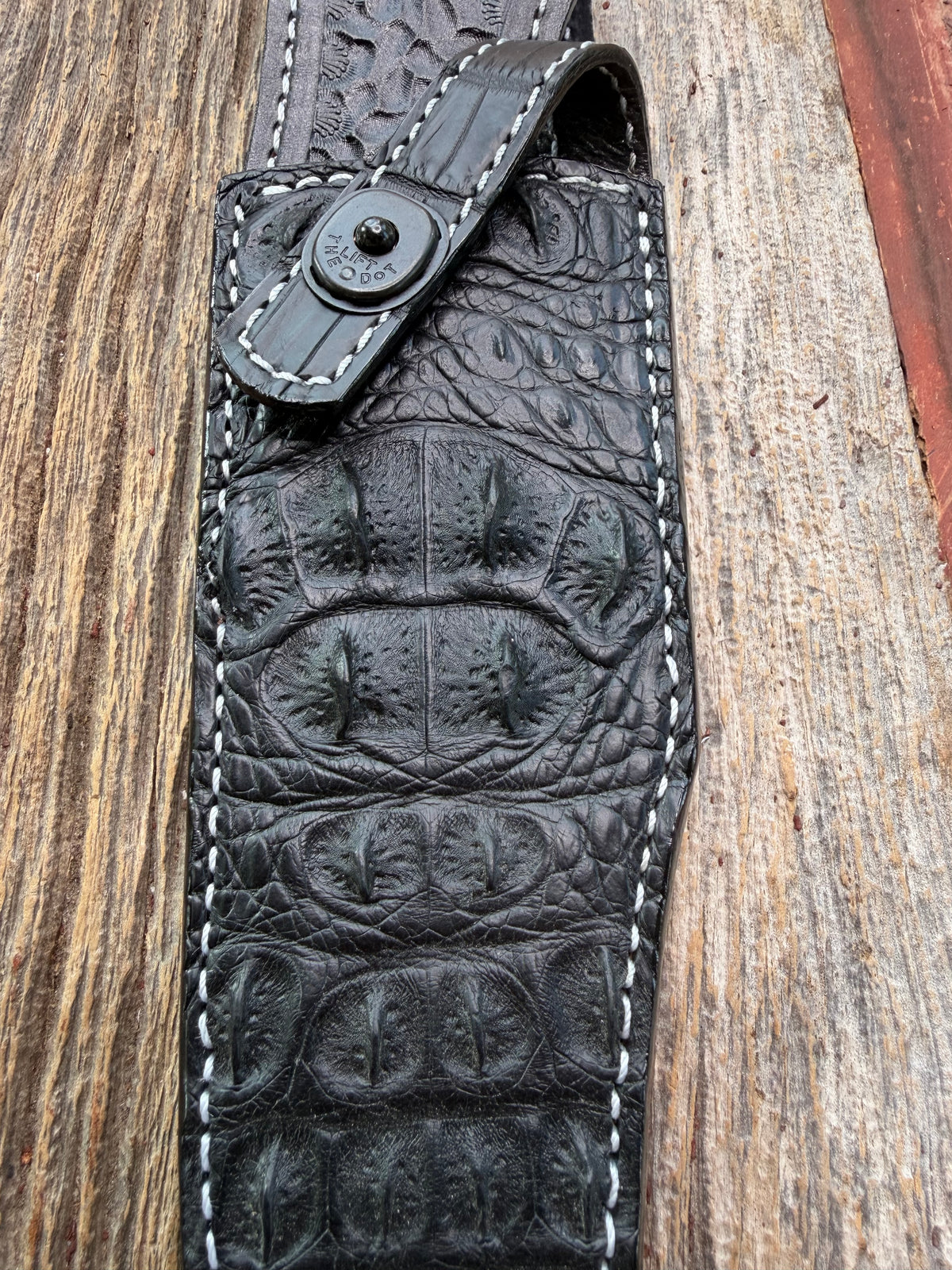 New Randall Model 12-8 Sheath in Exotic Black Matte Crocodile skull from Treeman with a Black Canteen snap. White thread deviated stitching on black leather..Killer sheath.