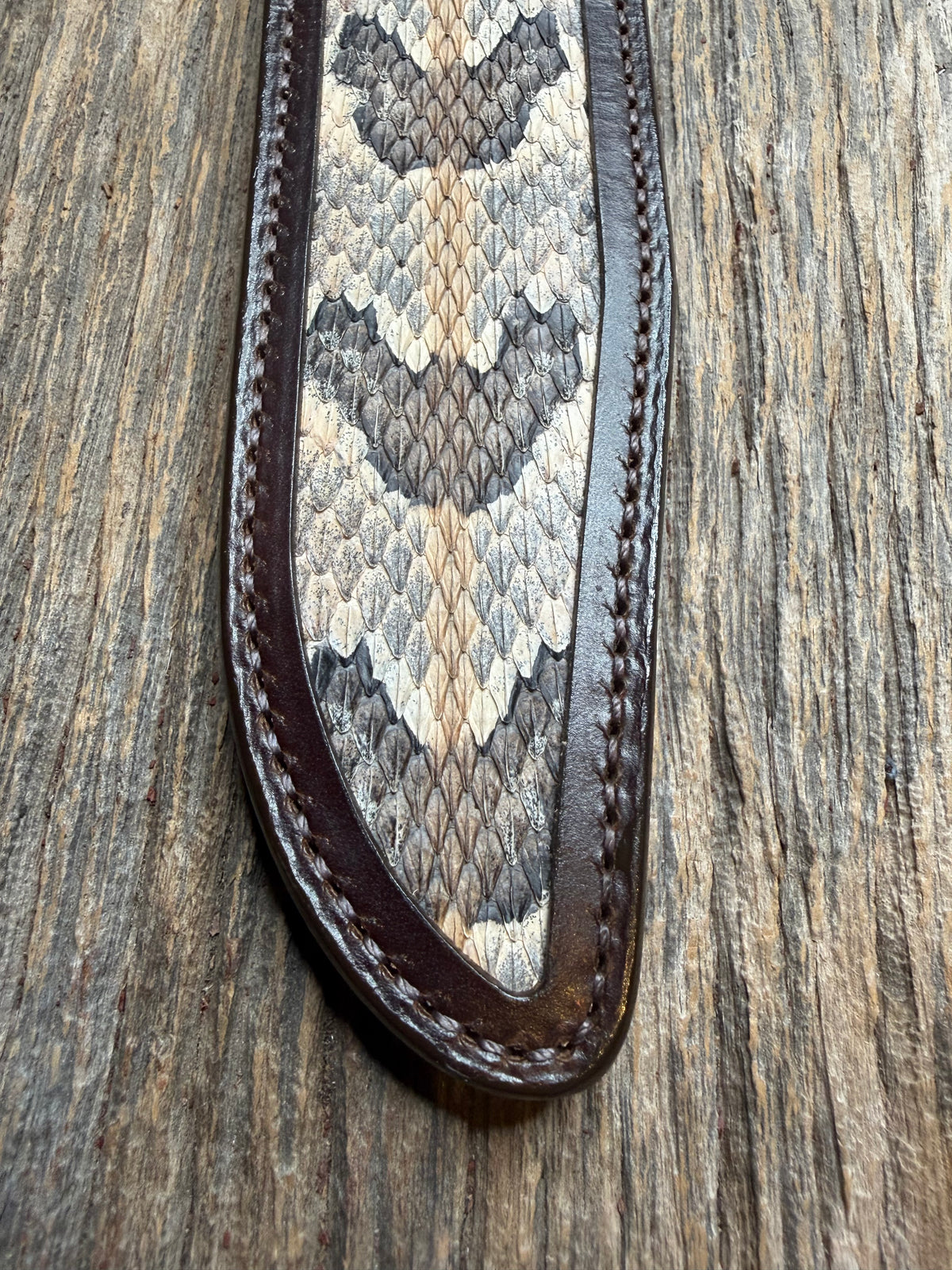 Randall Model 1-8 sheath with a Canebrake RattleSnake skin from Treeman Sheaths. Vibrant colors and along side Copperheads the hardest skin to source.