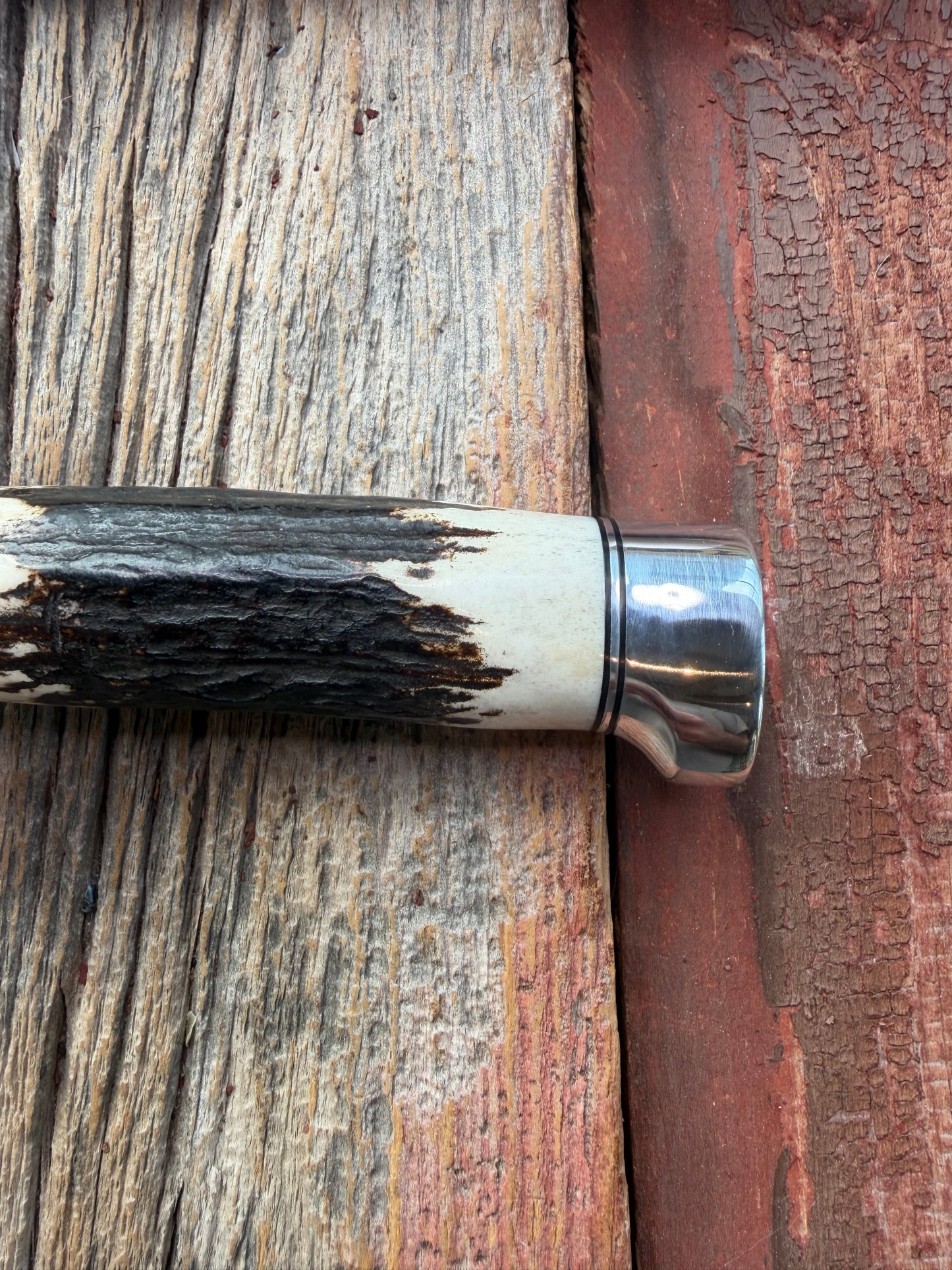 New in Paper Randall Made Knife Model 1-7 Stag , Stainless, Black and Aluminum spacers, Nickel Silver Hilt, Aluminum crows beak butt cap.