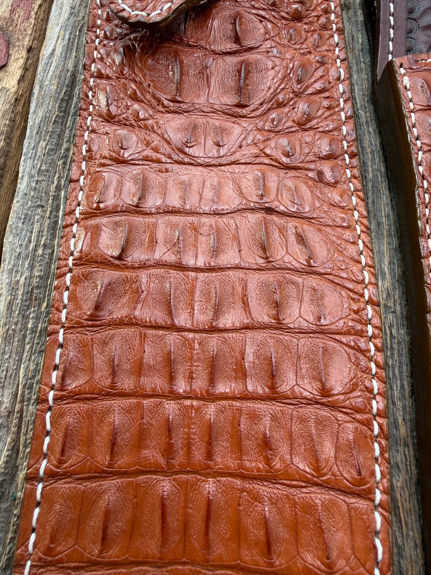 Pair of new Randall Model 12-11 Large and Small Sasquatch Sheaths in Exotic thick and textured Honey Crocodile skin ( skull portion) on brown leather from Treeman with a silver Canteen snap. Hand tooled belt loop. Killer sheath.