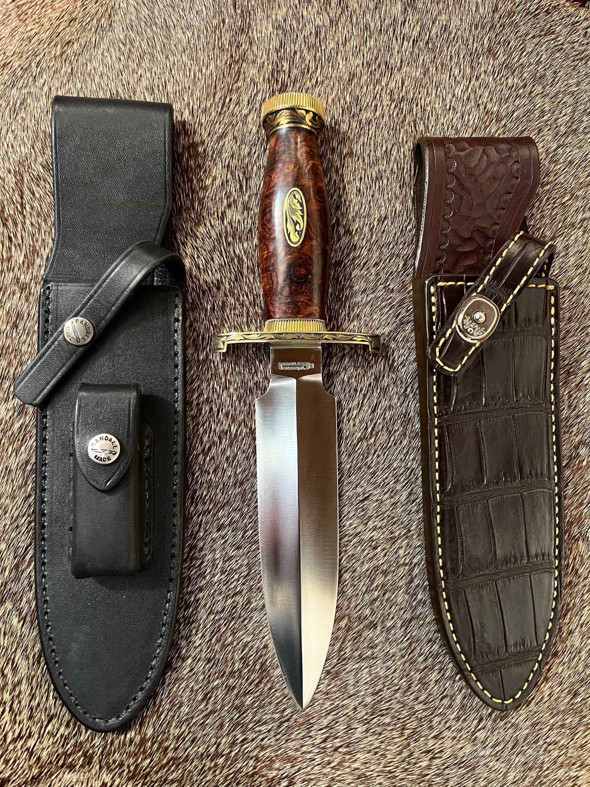 TC Special with Honduran Rosewood, Brass Lugged Hilt, Flanged Brass Butt Cap, Scalloped Brass Collar. Engraved by Master Engraver Jere Davidson