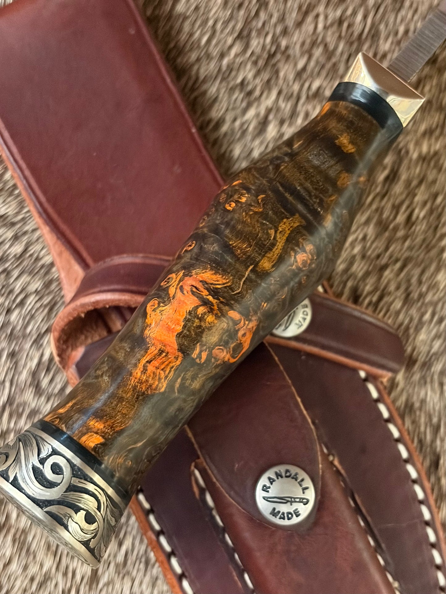 Model 19 Bushmaster                      Engraved by Jere Davidson with Fine Silver Inlay