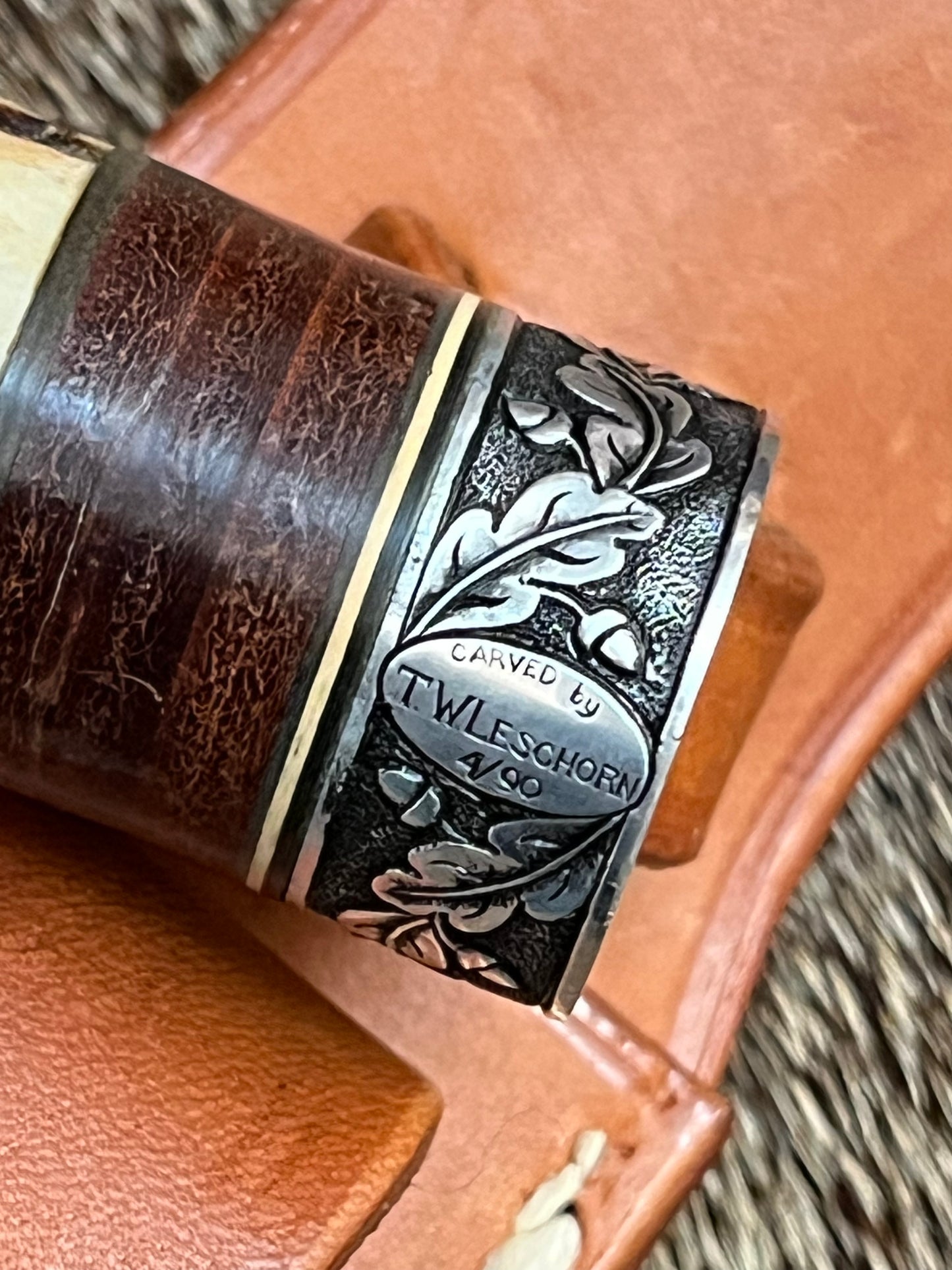 Model 25-Trapper 5” Tom Leschorn Carved, with Alaskan Gold Nugget Carved into a Buffalo