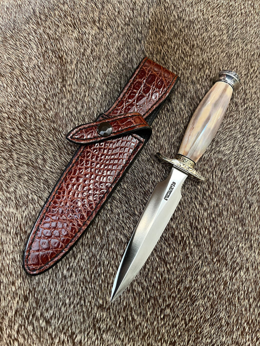 Model 2-5” Fossil Walrus with Custom Gutcher Sheath fully wrapped gloss brown crock, Engraving artist unknown, looks a lot like Ron Skaggs work