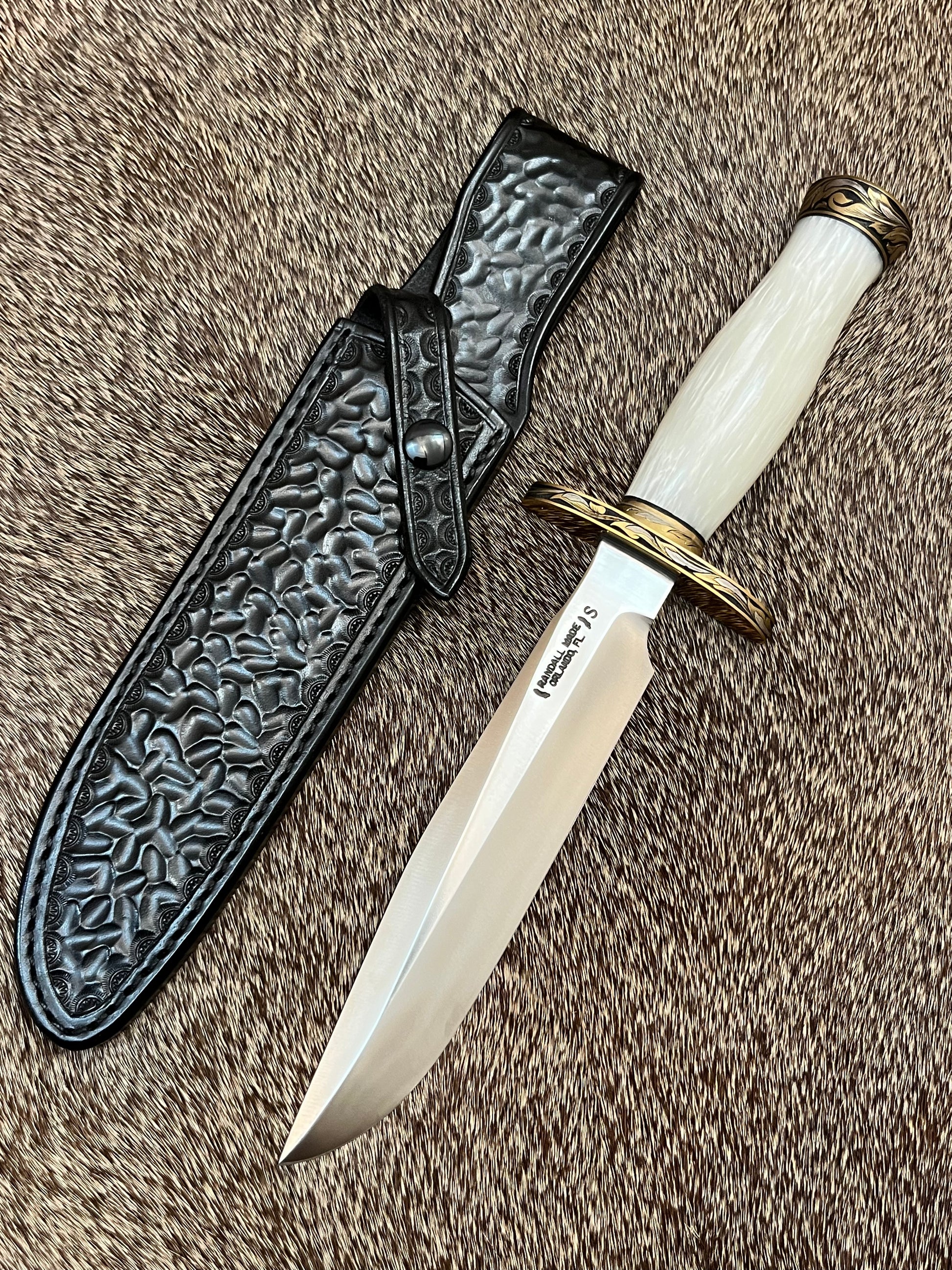Model 1-7” All Purpose Fighting Knife, Engraved by Master Engraver Jere Davidson with Fine Silver Inlays, comes with Custom Black Leather Tooled Gutcher Sheath