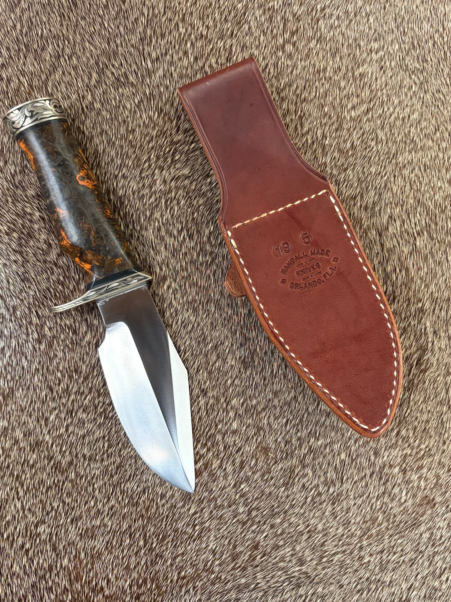 Model 19 Bushmaster                      Engraved by Jere Davidson with Fine Silver Inlay