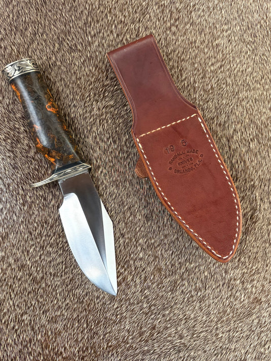 Model 19 Bushmaster                      Engraved by Jere Davidson with Fine Silver Inlay