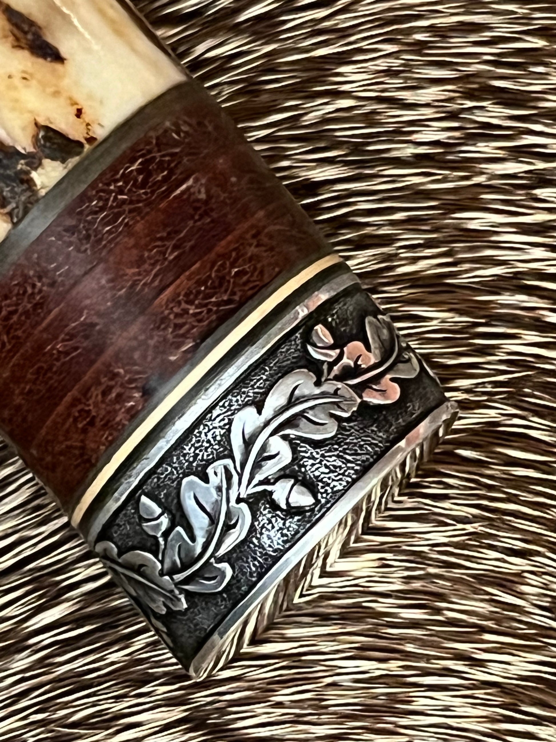 Model 25-Trapper 5” Tom Leschorn Carved, with Alaskan Gold Nugget Carved into a Buffalo