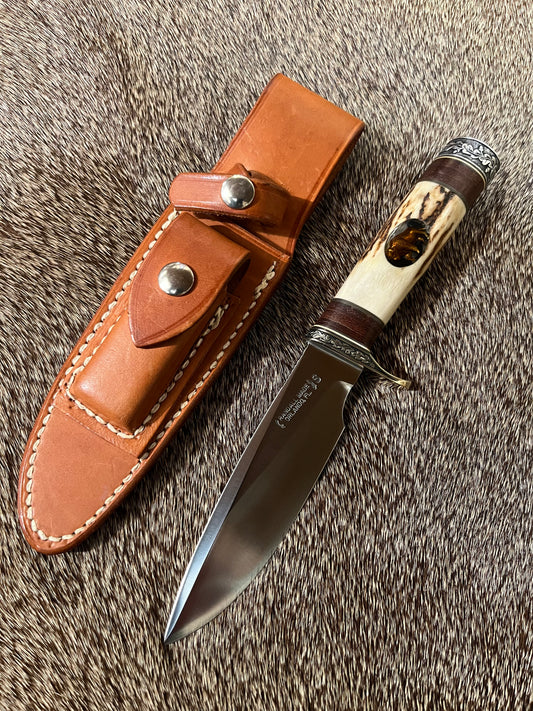 Model 25-Trapper 5” Tom Leschorn Carved, with Alaskan Gold Nugget Carved into a Buffalo