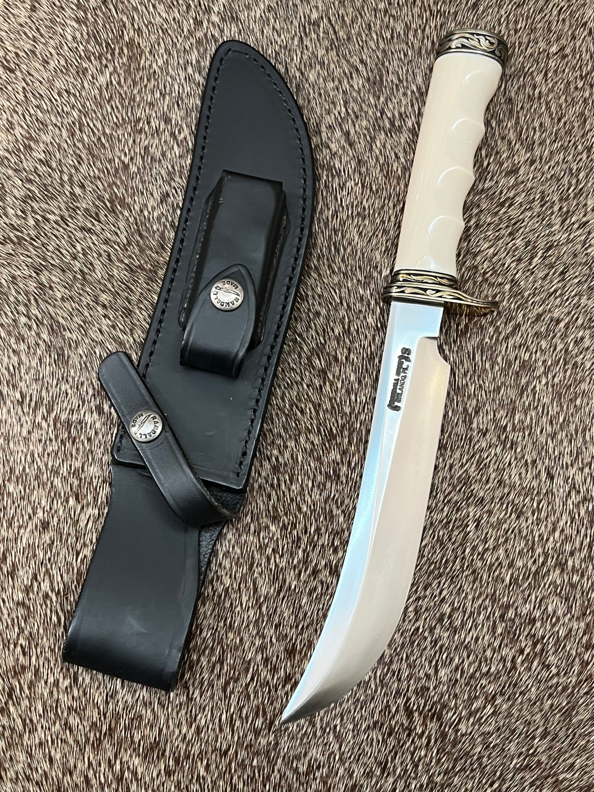 Model 4-7” Big Game and Skinner Elephant Ivory that is Flawless Engraved by Master Engraver Jere Davidson with Gold Inlay Only