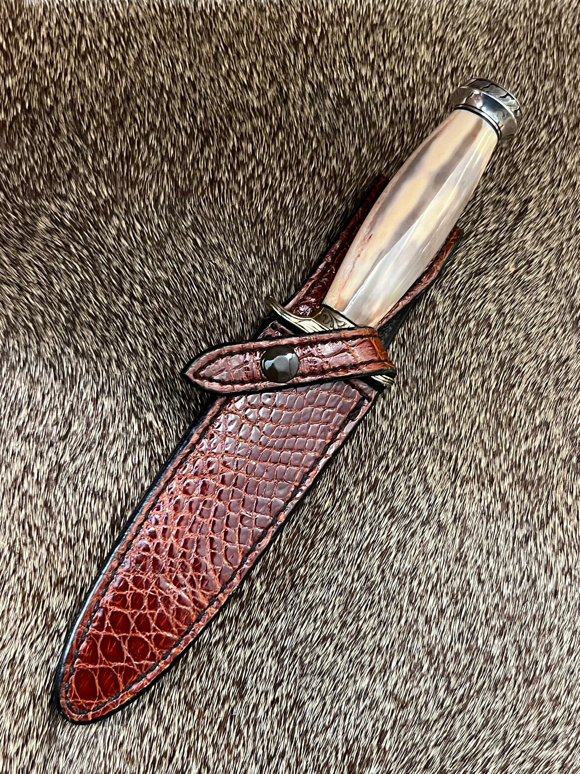 Model 2-5” Fossil Walrus with Custom Gutcher Sheath fully wrapped gloss brown crock, Engraving artist unknown, looks a lot like Ron Skaggs work