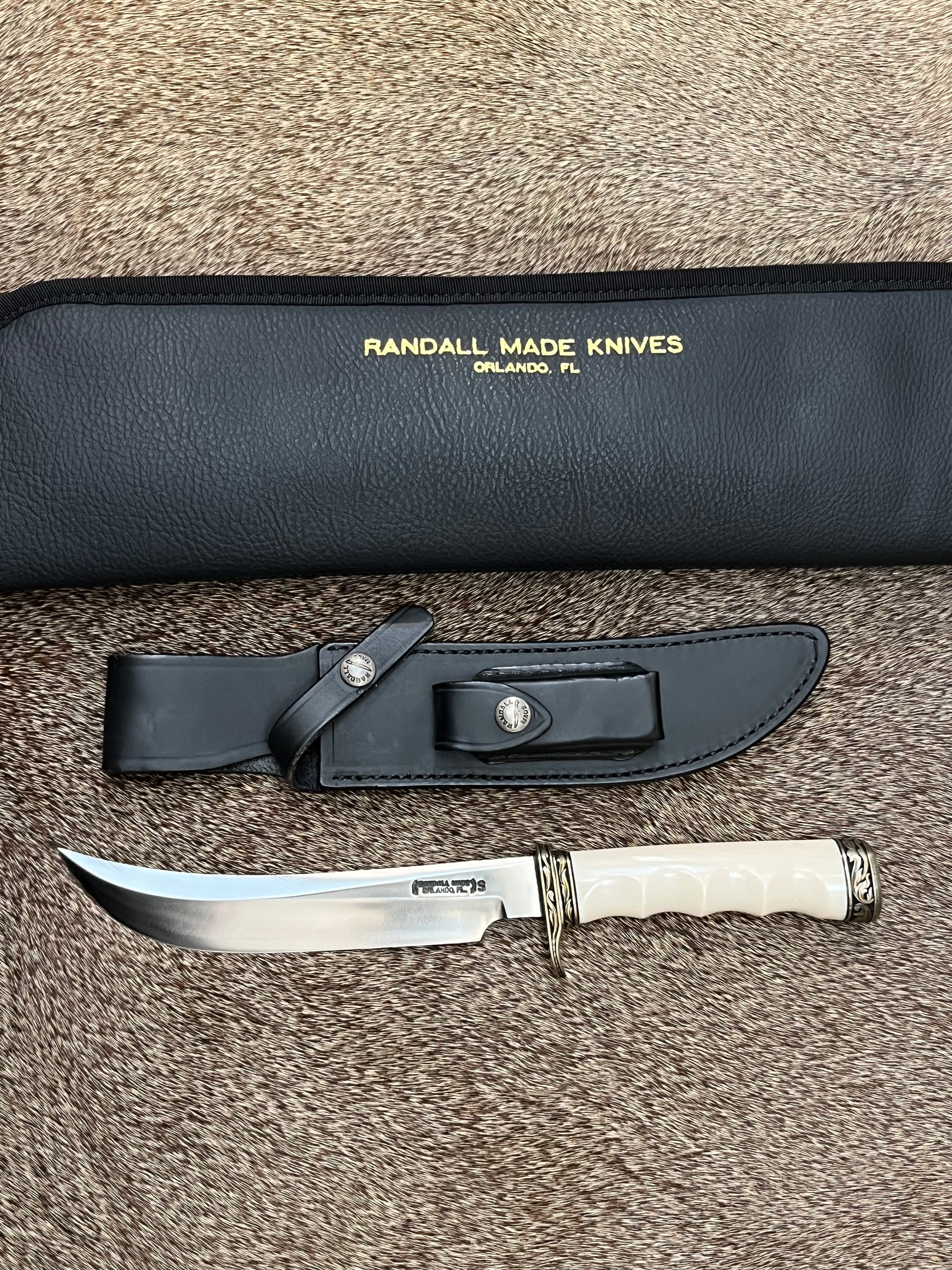 Model 4-7” Big Game and Skinner Elephant Ivory that is Flawless Engraved by Master Engraver Jere Davidson with Gold Inlay Only