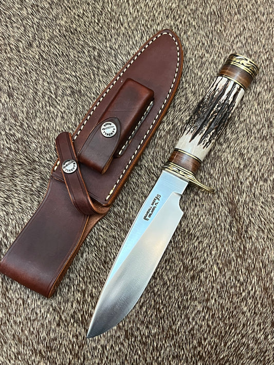Model 25 The Trapper                  Engraved by Master Engraver Jere Davidson with Fine Silver Inlay